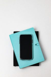 Stockfoto Notizbuecher und Handy